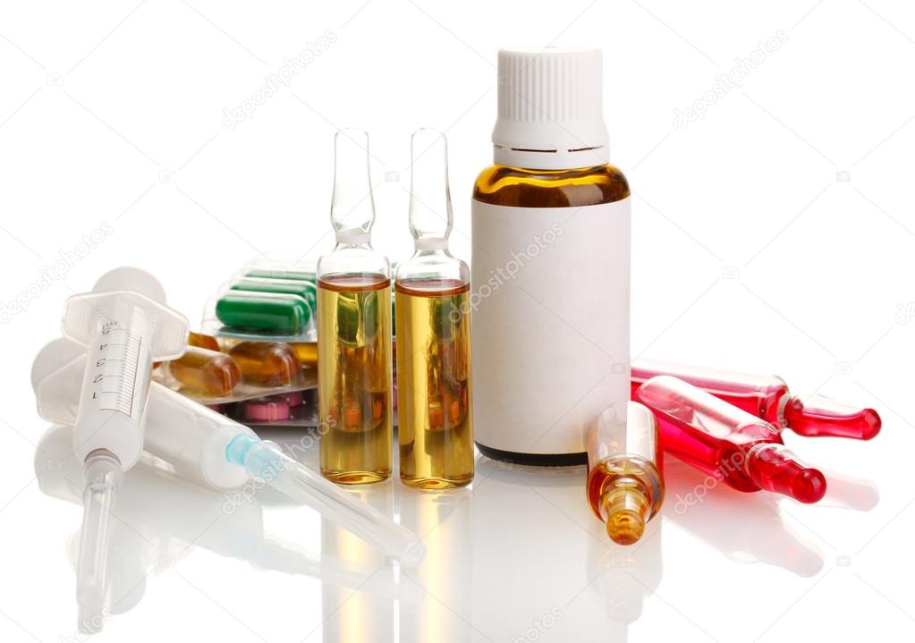 medical ampules, bottle, pills and syringes, isolated on white