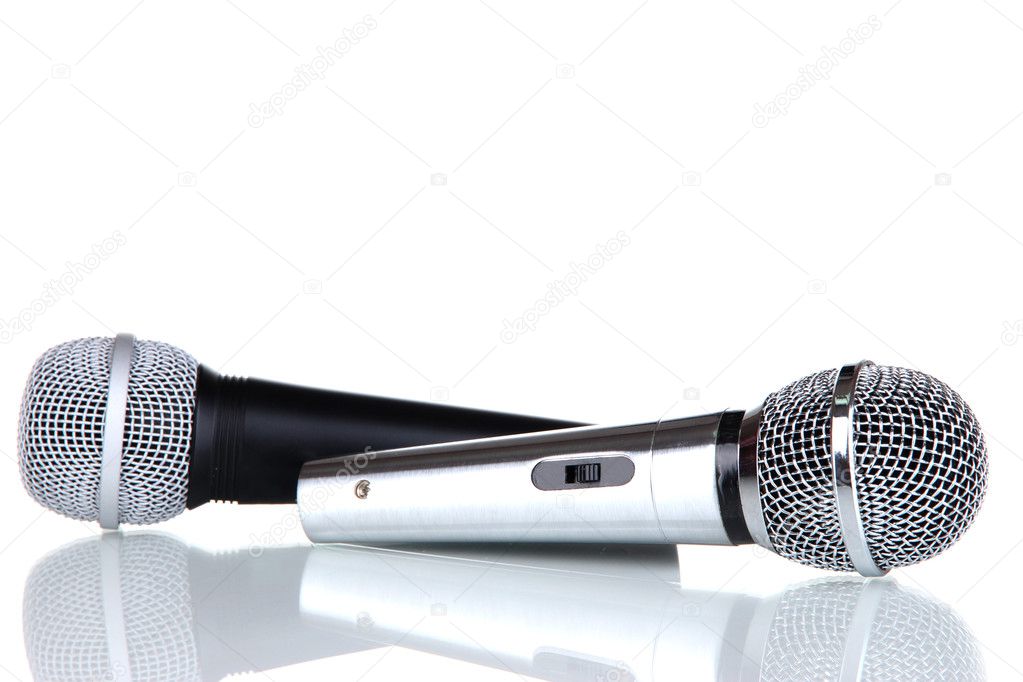 Silver and black microphones isolated on white