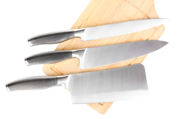 Uppsättning knivar på skärbräda isolerad på vit — Stockfoto
