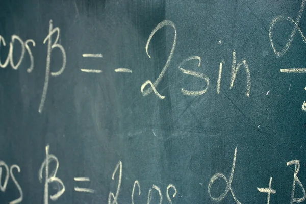 Math formula written on blackboard with chalk. — Stock Photo, Image