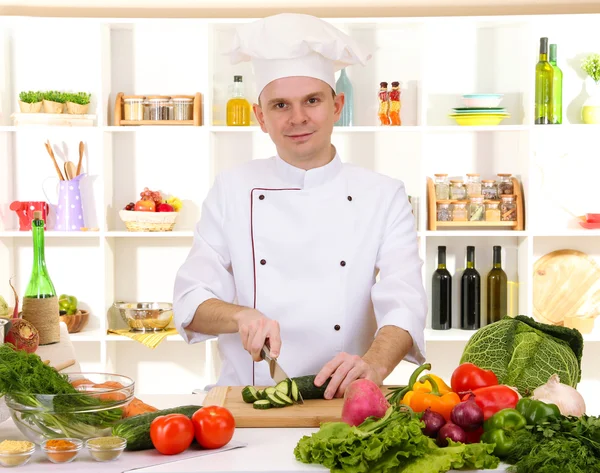 Chef cooking in kitchen — Stock Photo, Image