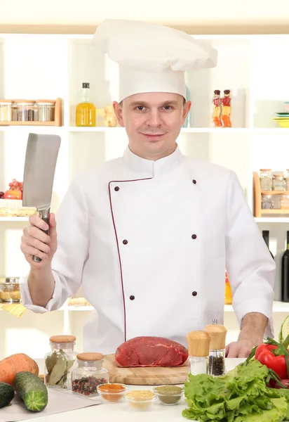 Chef cooking in kitchen — Stock Photo, Image