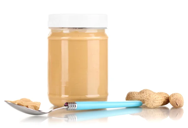 Delicious peanut butter in jar isolated on white — Stock Photo, Image
