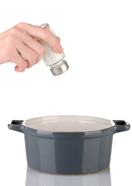 el ekleyerek tuz tuz shaker üzerinde beyaz izole kullanarak