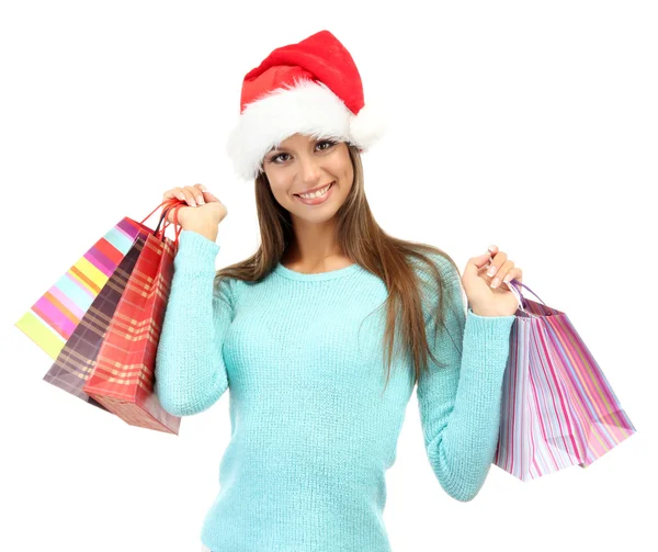 Hermosa joven con bolsas de compras, aislada en blanco — Foto de Stock