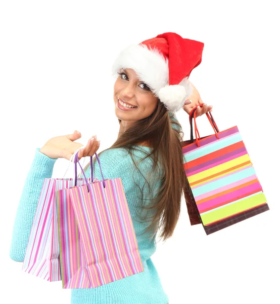 Hermosa joven con bolsas de compras, aislada en blanco — Foto de Stock