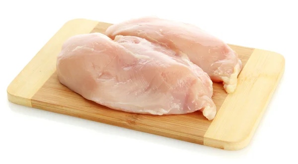 Raw chicken meat on cutting board, isolated on white — Stock Photo, Image