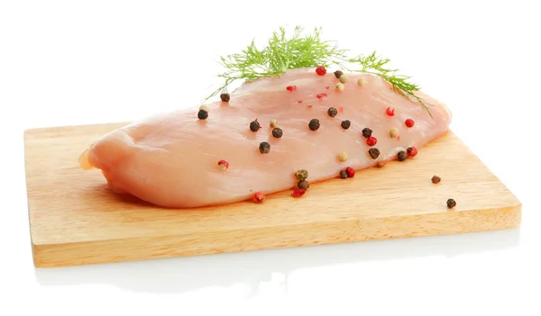 Carne de pollo cruda en la tabla de cortar, aislada en blanco —  Fotos de Stock