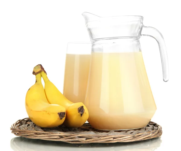 Full glass and jug of banana juice and bananas isolated on white — Stock Photo, Image