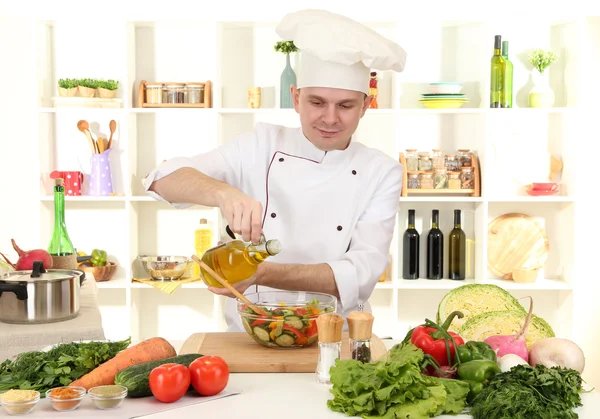 Chef cooking in kitchen — Stock Photo, Image