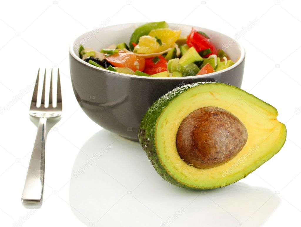 Tasty avocado salad in bowl isolated on white
