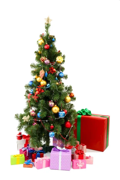 Decorated Christmas tree with gifts isolated on white — Stock Photo, Image