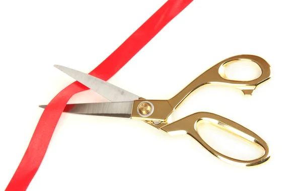 Cutting red ribbon isolated on white — Stock Photo, Image