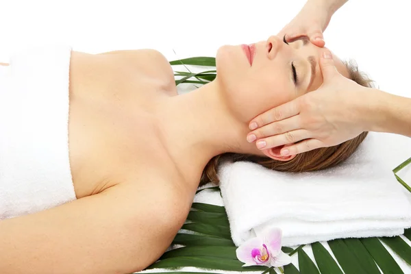 Portrait of beautiful woman in spa salon taking head massage — Stock Photo, Image