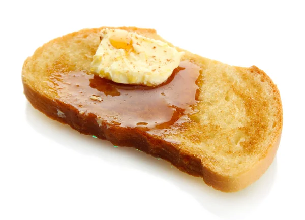 Pane tostato bianco con miele sul piatto, isolato su bianco — Foto Stock