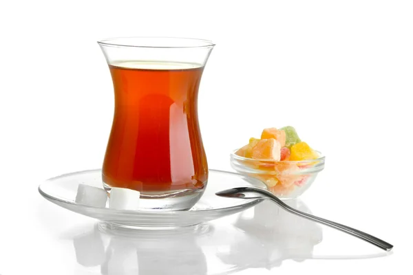 Glass of Turkish tea and rahat Delight, isolated on white — Stock Photo, Image