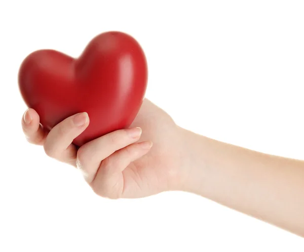Corazón rojo en la mano de la mujer, aislado en blanco — Foto de Stock