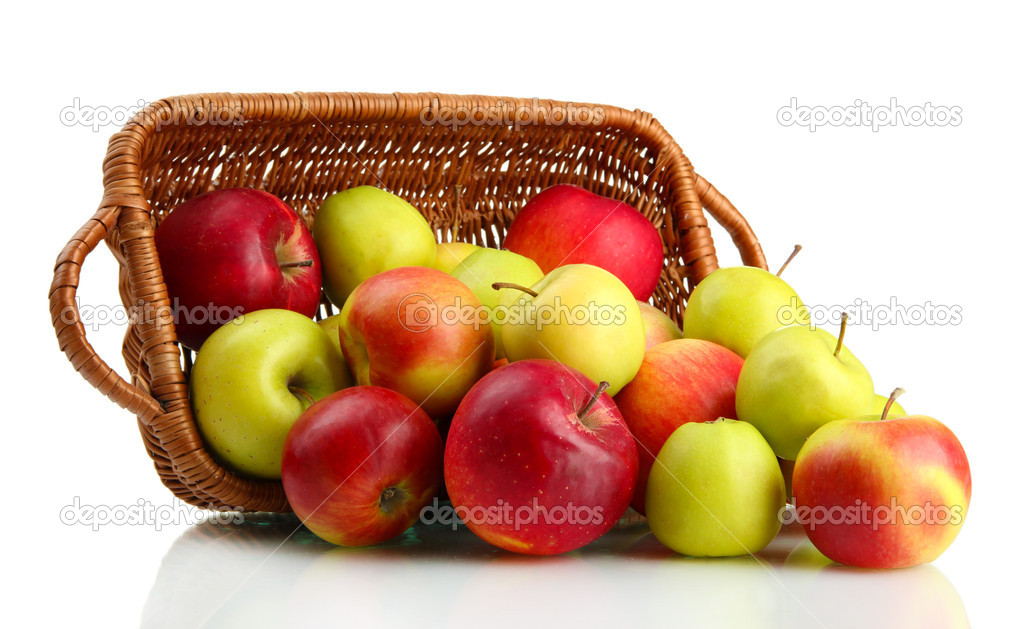 juicy apples in basket, isolated on white