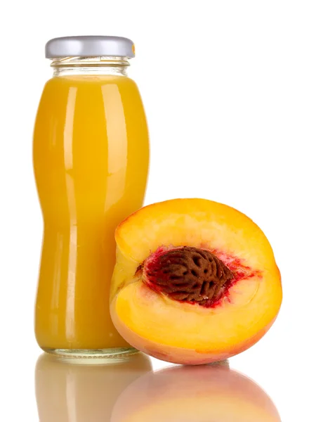 Delicious peach juice in glass bottle and peach next to it isolated on white — Stock Photo, Image