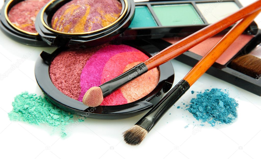 bright eye shadows and rouge with brushes, isolated on white