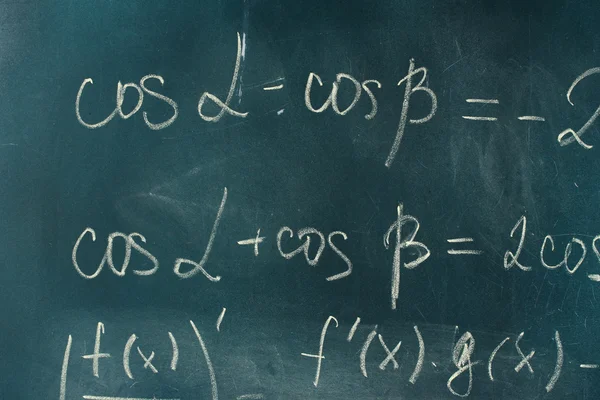 Math formula written on blackboard with chalk. — Stock Photo, Image