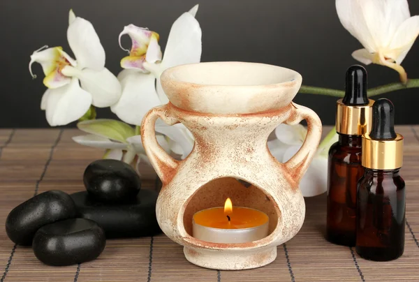 Aromatherapie lamp op grijze achtergrond — Stockfoto