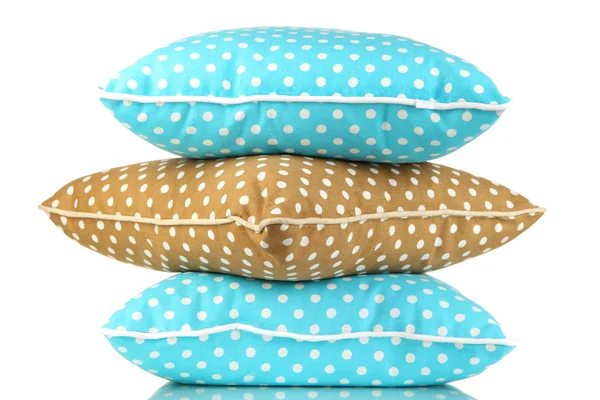Travesseiros azuis e castanhos brilhantes isolados em branco — Fotografia de Stock