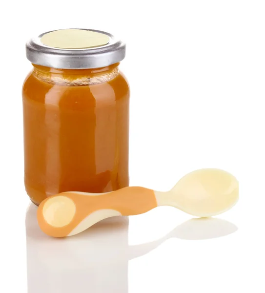 Useful and tasty baby food with beige small spoon isolated on white — Stock Photo, Image