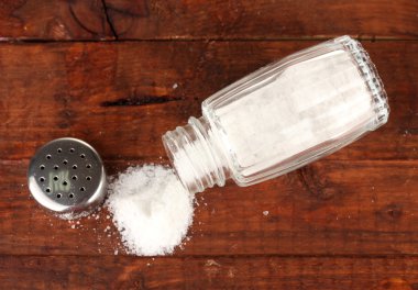 Salt sprinkled on table clipart