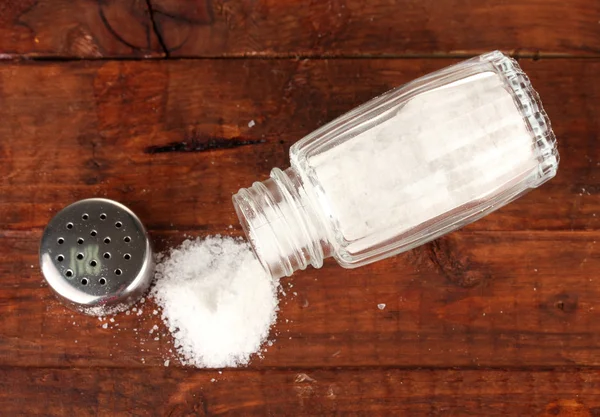 Salt sprinkled on table — Stock Photo, Image