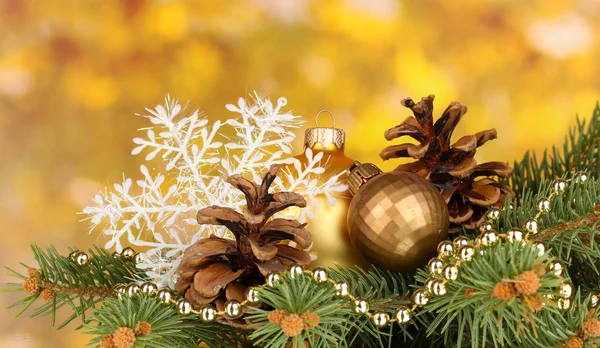 Christmas decoration on yellow background — Stock Photo, Image