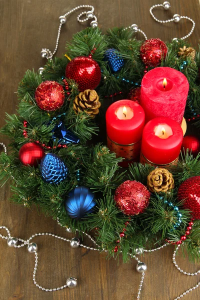 Beautiful Christmas wreath on wooden table close-up — Stock Photo, Image