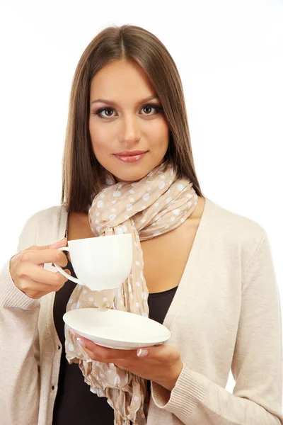 Mooie jonge vrouw met kop koffie, geïsoleerd op wit — Stockfoto