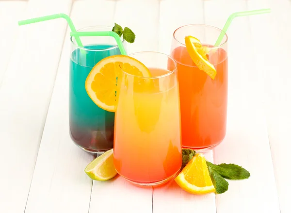 Three cocktails on white background — Stock Photo, Image