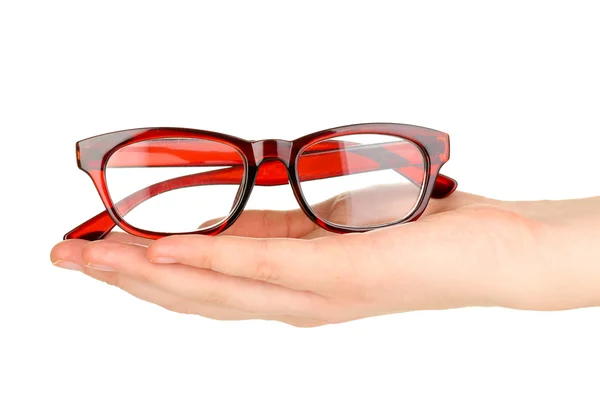 Belos óculos na mão feminina isolados em branco — Fotografia de Stock