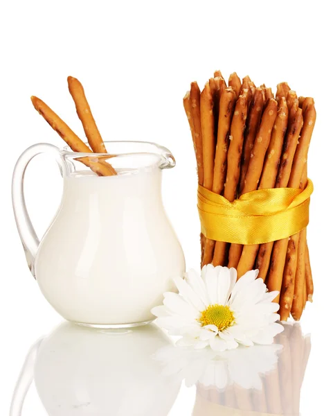 Tasty crispy sticks with pitcher with sour cream isolated on white — Stock Photo, Image