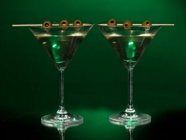 Martini glasses on dark background — Stockfoto