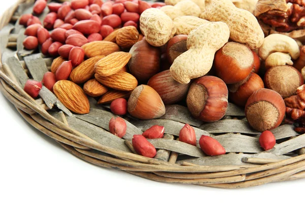 Assortment of tasty nuts, isolated on white — Stock Photo, Image