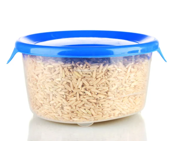 Коричневий рис в банці на білому фоні — стокове фото