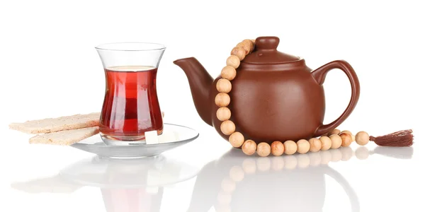 Glass of Turkish tea and kettle isolated on white — Stock Photo, Image