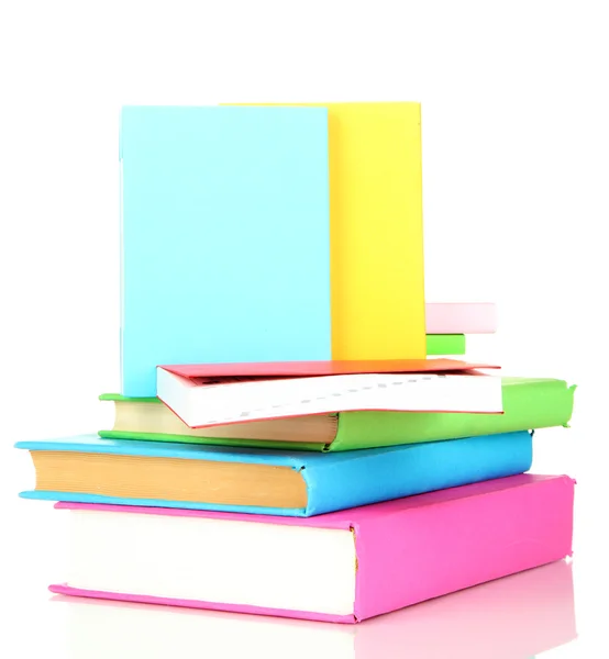 Empilement de livres multicolores isolés sur blanc — Photo