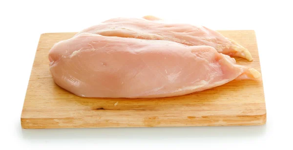 Raw chicken meat on cutting board, isolated on white — Stock Photo, Image