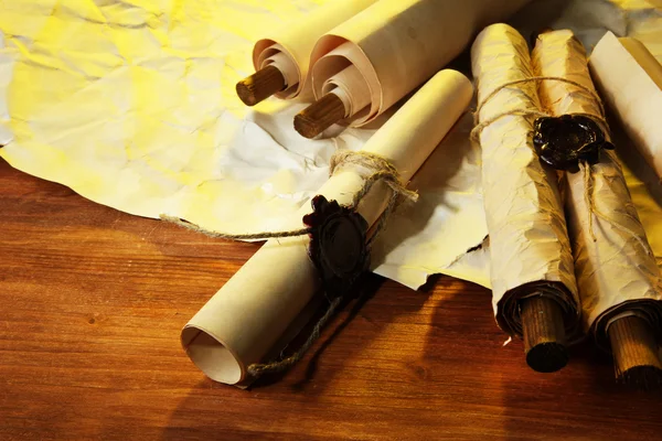 Old scrolls, on brown paper background — Stock Photo, Image