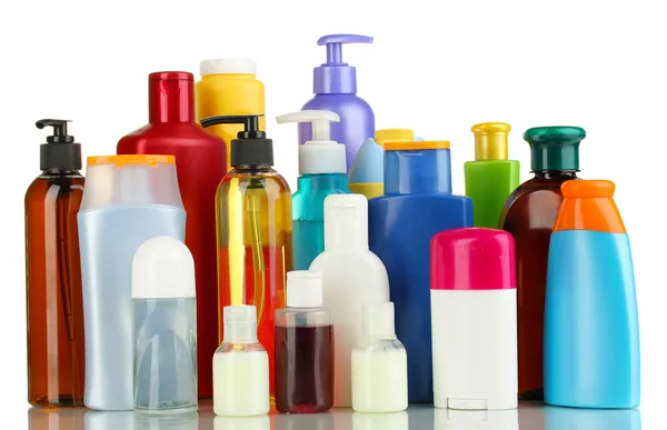 Muitos produtos cosméticos diferentes para cuidados pessoais isolados em branco — Fotografia de Stock