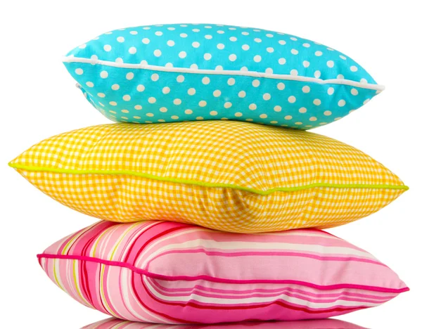 Blue, pink and yellow bright pillows isolated on white — Stock Photo, Image