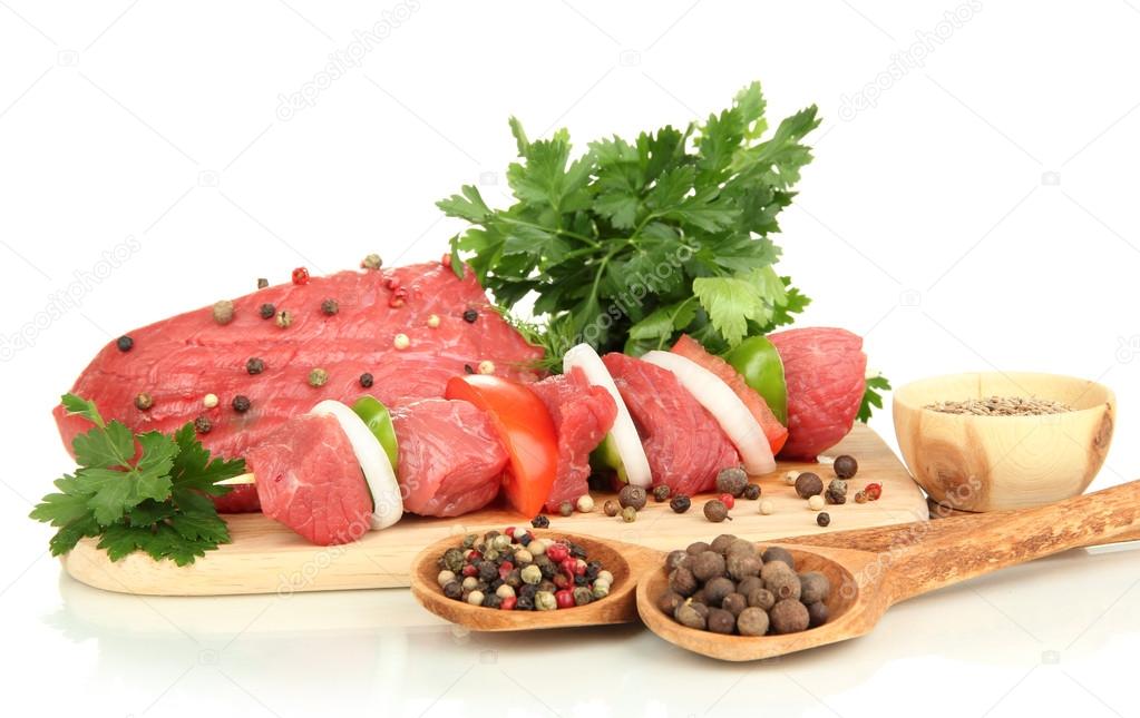 Raw beef meat marinated with herbs and spices isolated on white