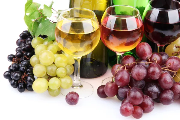 Bottles and glasses of wine and assortment of grapes, isolated on white — Stock Photo, Image