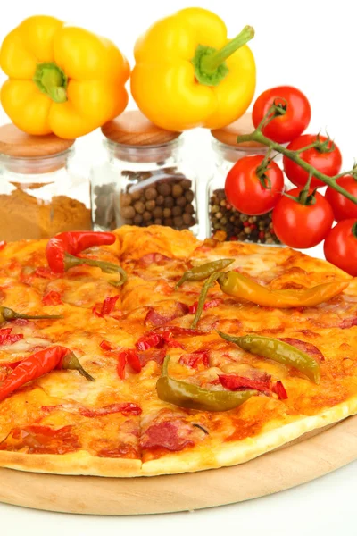 Tasty pepperoni pizza with vegetables on wooden board close-up Stock Image