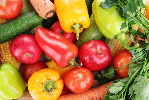 Sortiment av färska grönsaker och frukter som bakgrund — Stockfoto