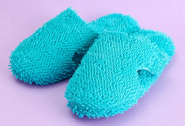 Bright slippers, on purple background — Stock Photo, Image